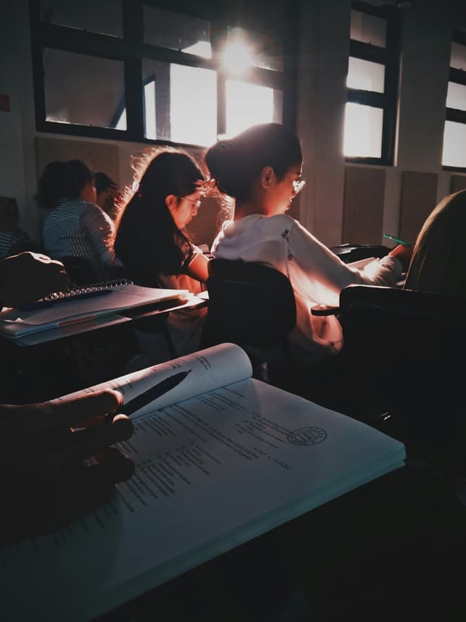 Students preparing together in a classroom before their IELTS test